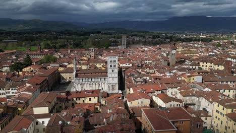 Lucca-Italy-sunny-downtown-aerial-as-clouds-sweep-through-scene