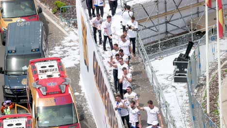 At-Cibeles-Square-in-Madrid,-Spain,-Real-Madrid-players-celebrate-their-36th-La-Liga-championship-with-thousands-of-fans