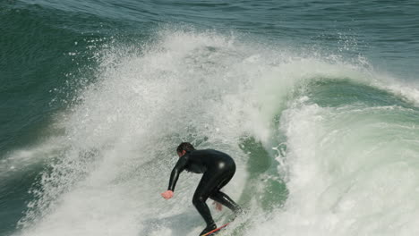A-surfer-catches-a-nice-wave-at-Steamer-Lane-in-Santa-Cruz,-CA