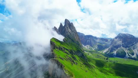 View-from-above,-stunning-aerial-view-of-the-mountain-range-of-Seceda-during-a-cloudy-day