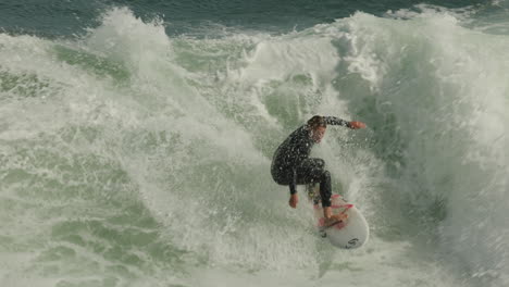 A-surfer-catches-a-nice-wave-at-Steamer-Lane-in-Santa-Cruz,-CA