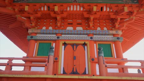 Traditional-Wooden-Japanese-Multi-Storey-Pagoda-Painted-in-Red-at-Kiyomizu-Dera-Temple-in-Kyoto,-torii