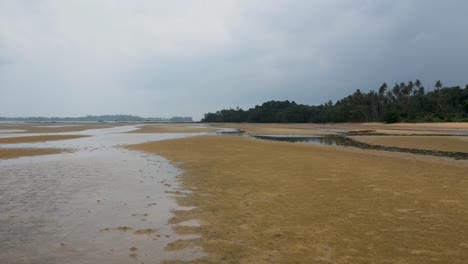 Aerial-Low-Flying-Over-Ao-Tan-Beach-During-Low-Tide-At-Koh-Mak