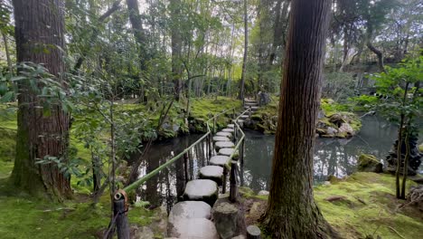 Stone-Pathway-And-Koi-Pond-At-Zen-Garden-Of-Tenjuan-In-Nanzenji-Temple,-Kyoto,-Japan