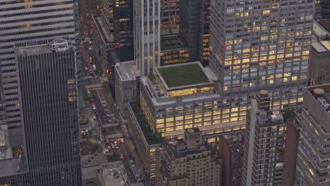 NYC-New-York-Aerial-v347-zoomed-birds-eye-view-flyover-capturing-office-blocks-along-Lexington-Ave,-pan-up-reveals-Midtown-Manhattan-skyscrapers-cityscape---Shot-with-Mavic-3-Pro-Cine---September-2023