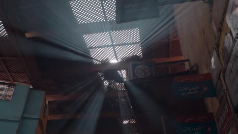 Sunbeams-through-the-wooden-lattice-roof-of-Fez-Medina