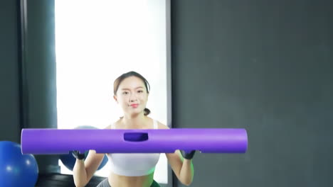 Beautiful-woman-working-out-with-stability-ball-or-fitness-ball