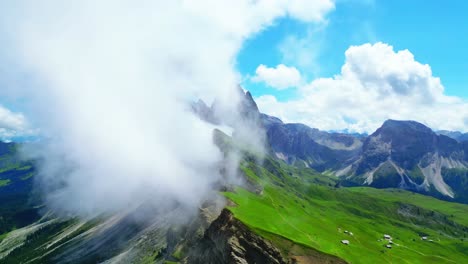 View-from-above,-stunning-aerial-view-of-the-mountain-range-of-Seceda-during-a-cloudy-day