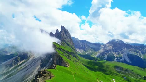 View-from-above,-stunning-aerial-view-of-the-mountain-range-of-Seceda-during-a-cloudy-day