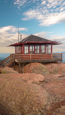 Vertical-4k-Timelapse,-Devil's-Head-Fire-Lookout-Station-on-Top-of-Summit-Above-Rocky-Mountains-Landscape-and-Horizon,-Pike-National-Forest-Colorado-USA