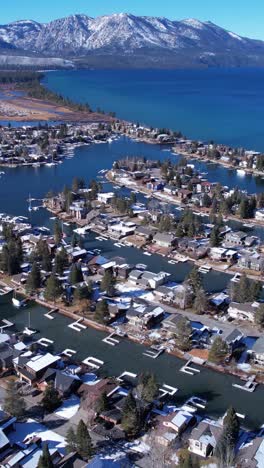 Vertical-Aerial-View-of-Tahoe-Keys-and-Lake-Tahoe-on-Sunny-Winter-Day,-California-USA