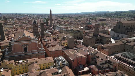 Flight-into-busy-city-square-in-Bologna-Italy-downtown