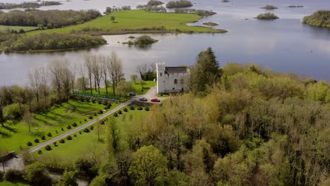 Panoramic-aerial-establishing-view-of-Cargin-castle-on-lough-corrib-lakeshore