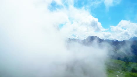 View-from-above,-stunning-aerial-view-of-the-mountain-range-of-Seceda-during-a-cloudy-day