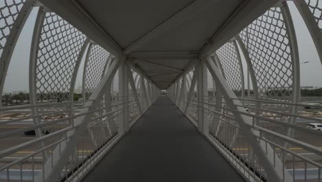 Pedestrian-Bridge-in-front-of-Sheikh-Zayed-Grand-Mosque-in-Abu-Dhabi,-United-Arab-Emirates