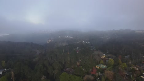 Drone-aerial-rising-above-the-town-of-Katoomba-to-go-into-the-clouds
