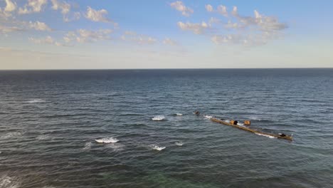 Drone-aerial-flying-above-and-panning-down-to-show-the-historical-Mildura-shipwreck