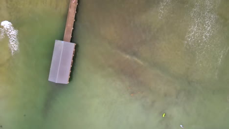 Aerial-View-Down-Upon-Hanalei-Bay-Pier-and-Beach