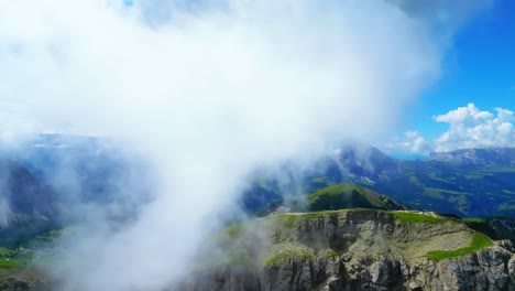 View-from-above,-stunning-aerial-view-of-the-mountain-range-of-Seceda-during-a-cloudy-day