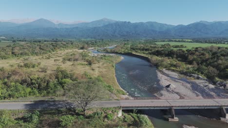 Discovering-a-bridge-on-Route-307-over-the-Romano-River,-in-Tucumán,-Argentina,-on-a-beautiful-sunny-day