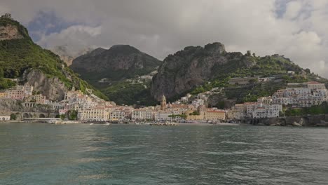 Approaching-the-town-of-Amalfi-by-ferry,-Amalfi-is-a-beautiful-town-of-the-Amalfi-coast,-closer-view