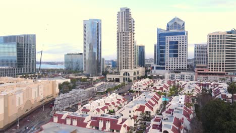 Park-Row-Condo-complex-in-downtown-San-Diego-with-skyline-in-background,-aerial-view
