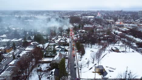 Smokes-from-school-fire-in-Montreal,-Canada,-aerial-panoramic-view
