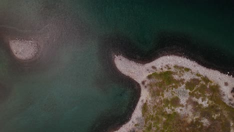 Rotating-areal-drone-shot-in-the-north-of-Norway-in-Gandajavri-lake-near-Barents-Sea