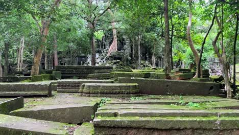 POV-dolly-in-establishing-of-Beng-Mealea-temple-ruins-in-slow-motion,-Cambodia's-lone-tourist-site