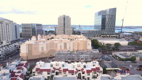 Park-Row-condo-complex-and-bay-in-background,-aerial-drone-view