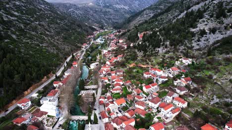 slow-aerial-show-of-stolac,-small-town-in-Herzegovina-with-Bregava-river