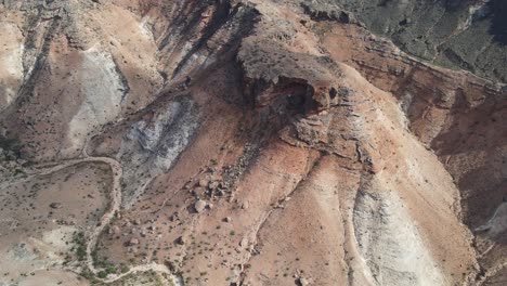 Drone-aerial-pan-up-over-the-ridges-of-the-Charles-knife-gorge-revealing-the-landscape