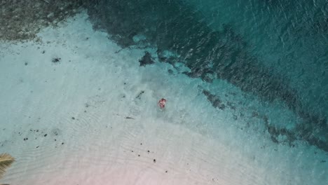 Girl-going-out-of-the-water-on-a-Paradise-Island-in-Panama