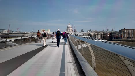 POV-Walking-Across-Millennium-Bridge-On-Sunny-Morning-With-View-Of-St-Paul's-Cathedral-In-background