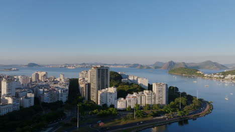 Aerial-flyover-of-an-peninsula-off-Botafogo-Bay-in-Rio-de-Janeiro-with-roads-and-apartment-buildings
