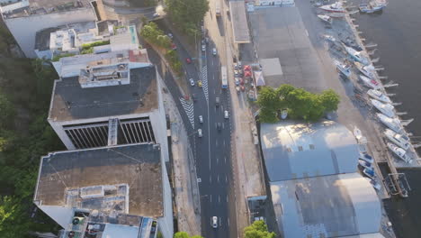 Flyover-footage-of-traffic-in-Botafogo-in-Rio-de-Janeiro-in-the-morning-light-on-Av