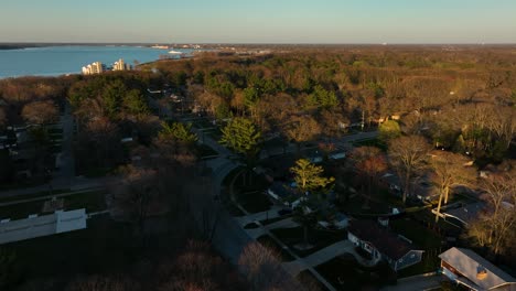 Spring-sun-setting-in-the-distance-leaving-warm-colors-across-the-treetops