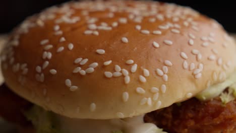 Sesame-seeds-on-fried-chicken-burger-rotating