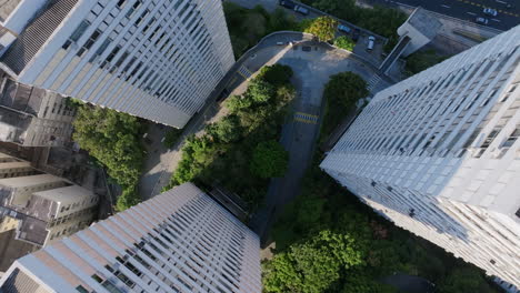 Top-down-aerial-footage-rotating-in-the-middle-of-three-apartment-buildings-in-Botafogo-in-Rio-de-Janeiro-Brazil