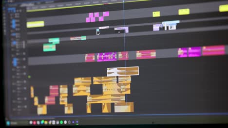 Close-up-of-a-video-editing-timeline-in-action,-showing-dynamic-clip-manipulation