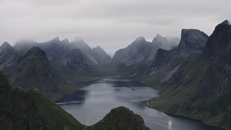 Timelapse-of-Kirkefjord-with-cloudy-atmosphere,-Reine,-Lofoten-Islands,-Norway