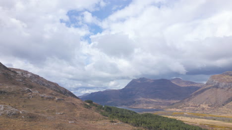 Majestic-view-of-Beinn-Eighe,-Scotland,-with-mountains-and-cloudy-skies-during-the-day