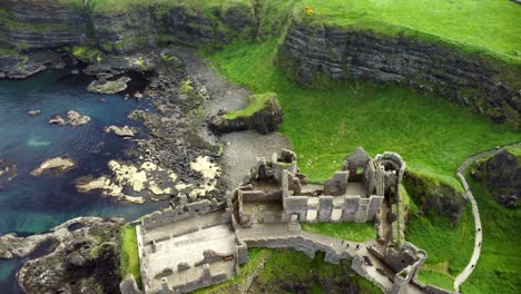 Aerial-shot-of-Dunluce-Castle,-in-Bushmills-on-the-North-County-Antrim-coast-in-Northern-Ireland