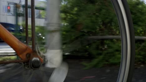 Bicycle-Wheel-Rotating-Close-Up-Shot-during-Riding