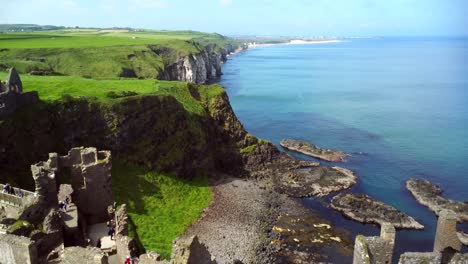 Aerial-shot-of-Dunluce-Castle,-in-Bushmills-on-the-North-County-Antrim-coast-in-Northern-Ireland