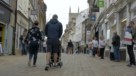 Busy-town-center-pedestrians-walking-with-no-social-distancing-on-Super-Saturday