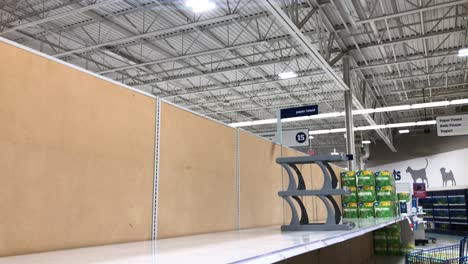 Empty-paper-towel-shelves-in-a-grocery-store