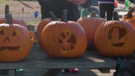 Carved-pumpkins-from-a-Halloween-party.-Zooming-out