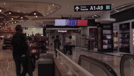 Cancun-International-Airport-people-walking-towards-the-gate-areas