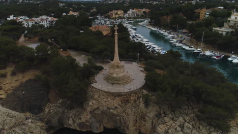 Drone-Shot-orbiting-around-a-beautiful-Landmark-in-Mallorca-next-to-the-Sea,-4k-UHD